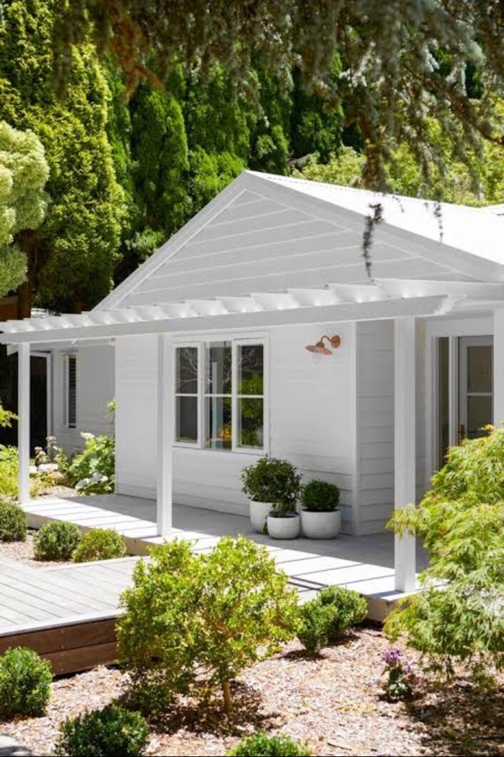 Bright white painted weatherboard home exterior