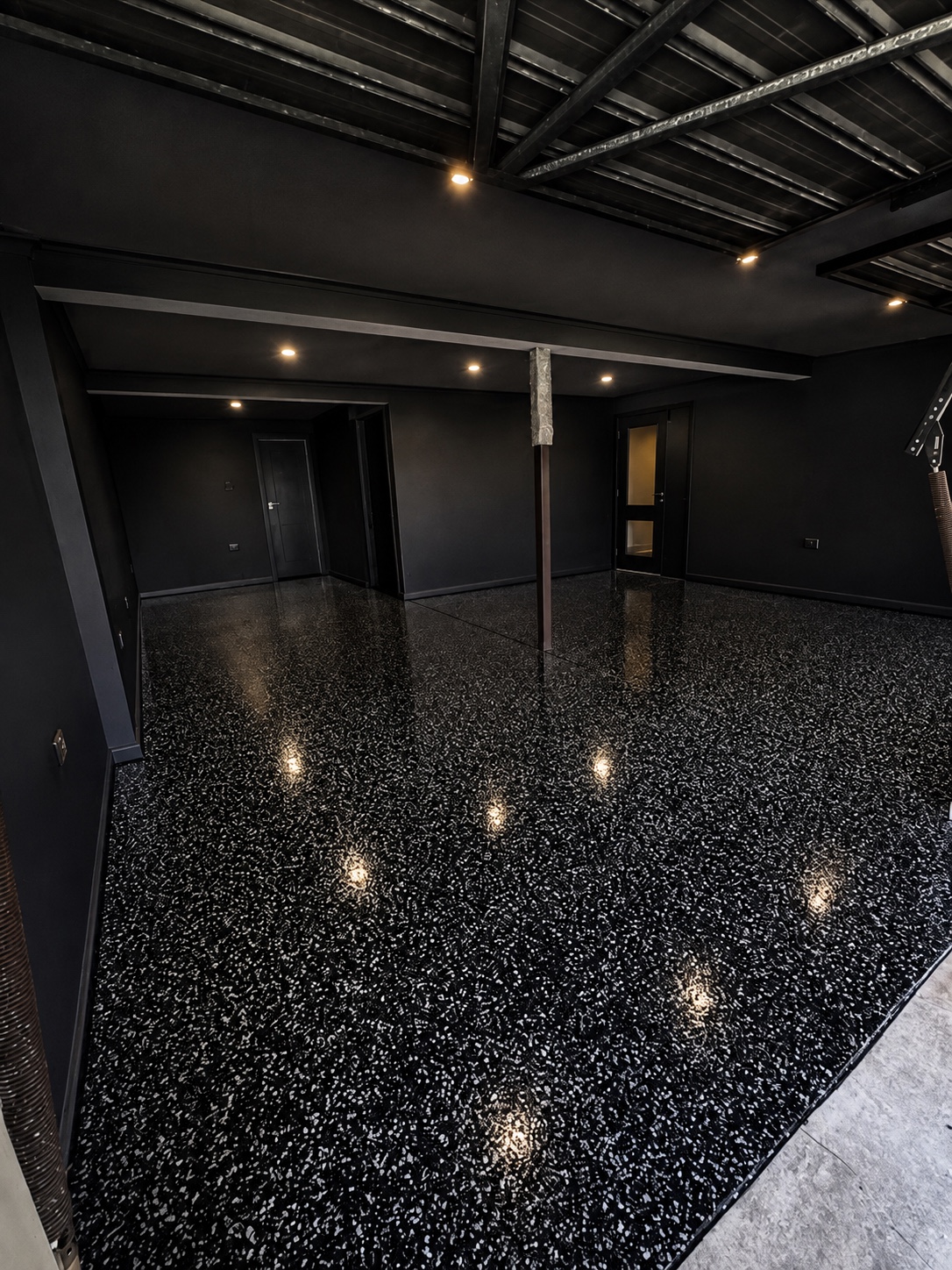 Glossy black premium flake epoxy floor