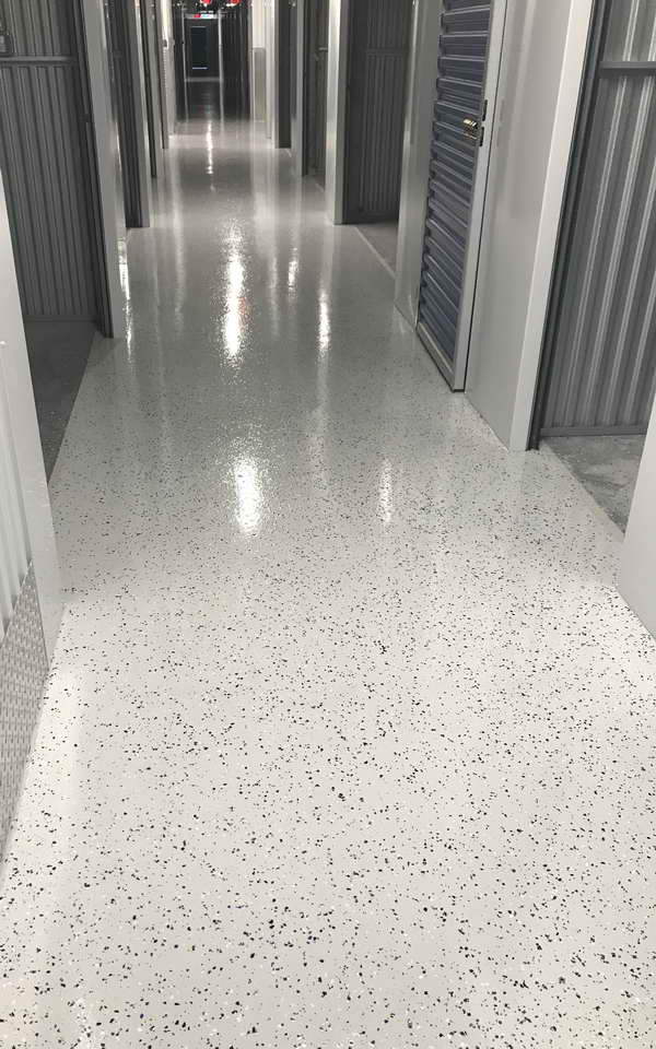 Light grey flake epoxy commercial floor
